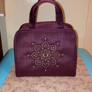 Oscar de la Renta bagwith toiletry containers incl